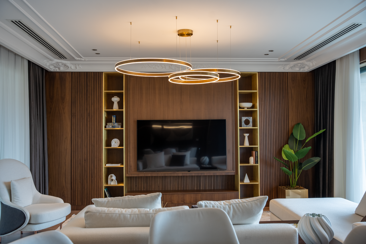 about-us Sophisticated living room featuring contemporary furniture and unique lighting for a luxurious feel.